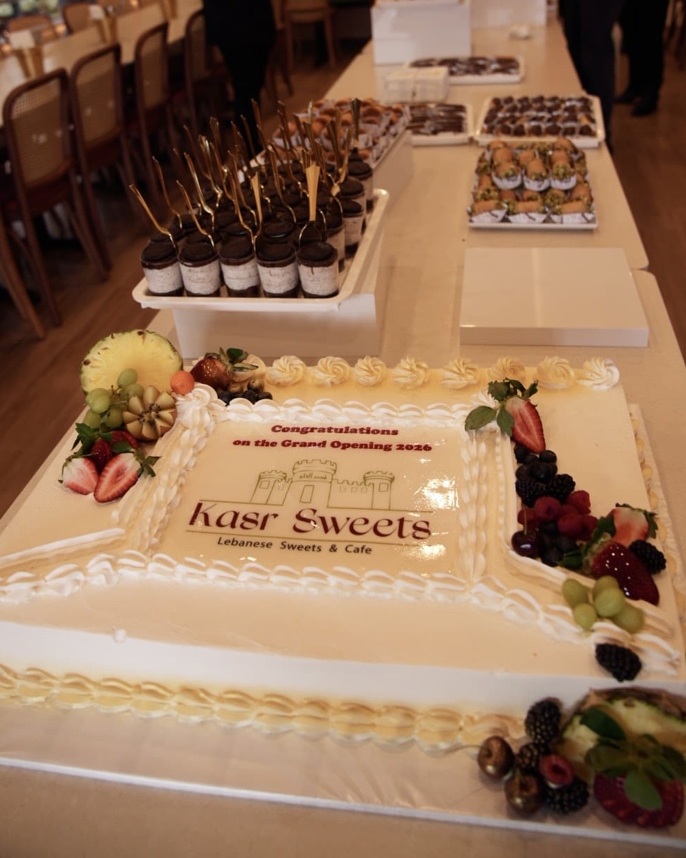 Kasr Sweets celebration cake at a grand opening